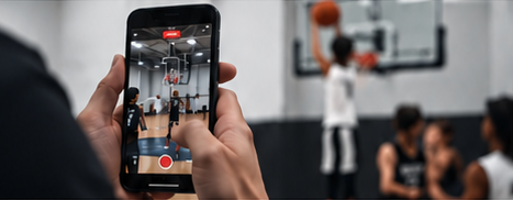 A parent captures basketball footage on their phone